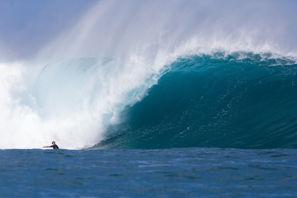 Brandon "Laserwolf" Campbell surfing an outer reef.