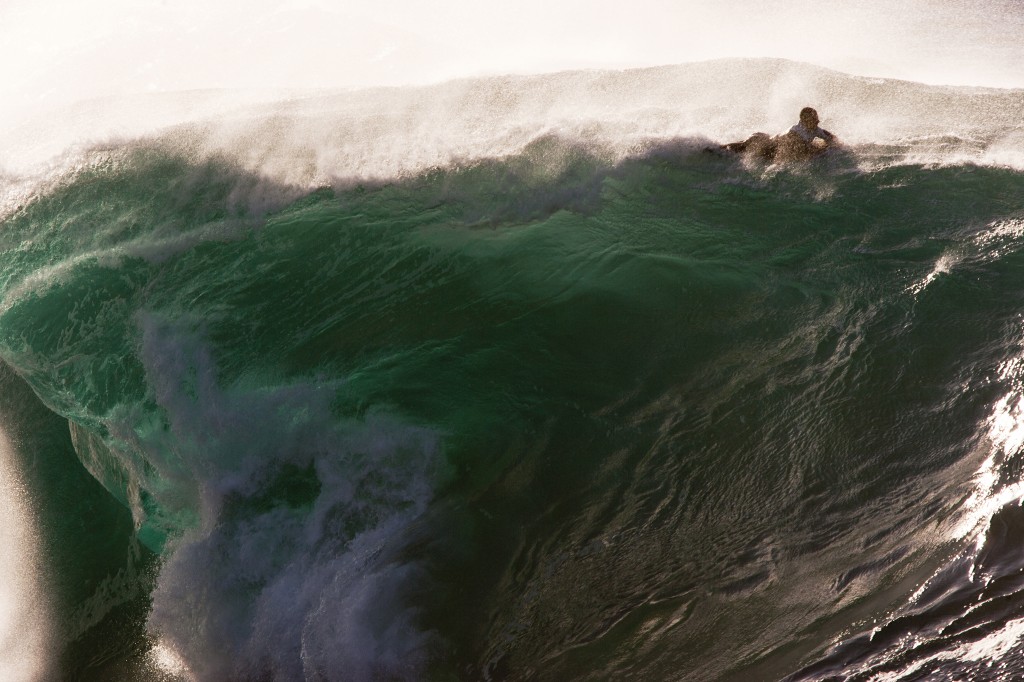 Brenden Newton on big wave by Ray Collins