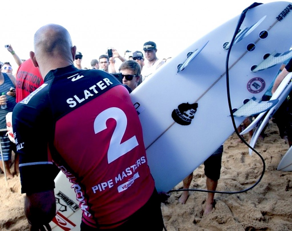 Kelly Slater and the six-six CI Semi-Pro he rode to victory against John John Florence at the 2013 Pipeline Masters.