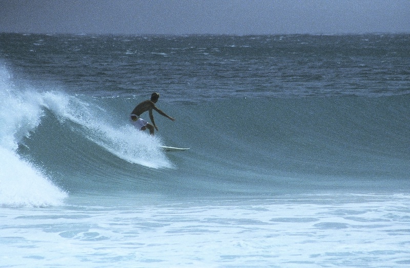Professional surfer Chas Smith (pictured) doing his patented down the line backside move in Yemen 2002.