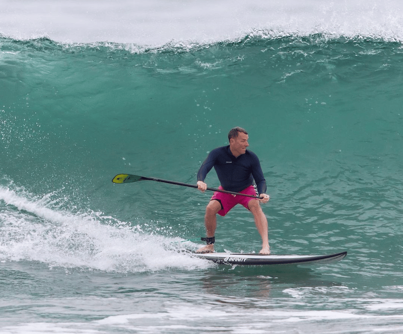 World Surf League CEO Erik Logan (pictured) with paddle.
