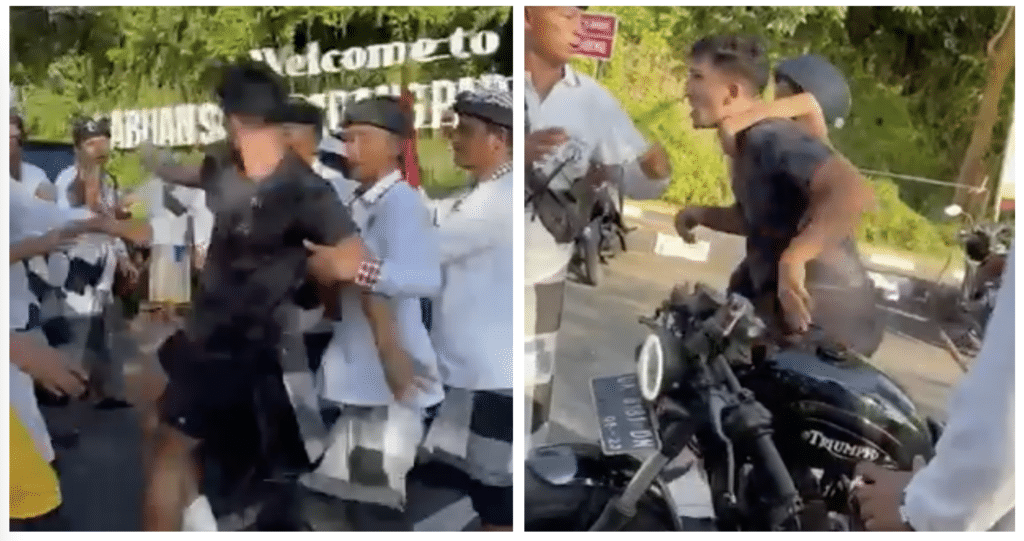 Shocking video showing Bali tourist becoming violent after being refused permission to ride his motorcycle through a Hindu purification ceremony shakes island paradise to its core!