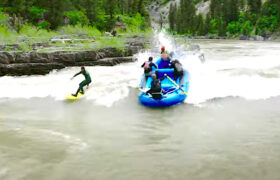 Dylan Graves dodges whitewater rafters on Wyoming's Snake River.
