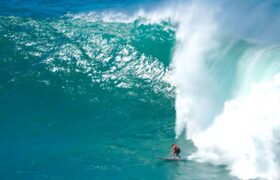 Jamie O'Brien on a sixty foot wave at the Eddie Aikau Big Wave Invitational