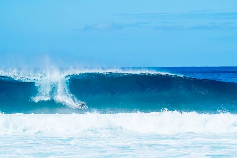 Women surfers prepare for historic bar-raising at Hawaii’s notorious Pipeline!