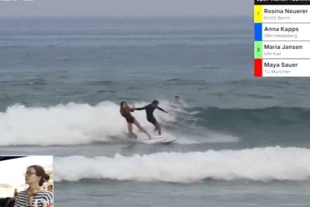 French male surfer pushes German girl surfer in Hossegor.