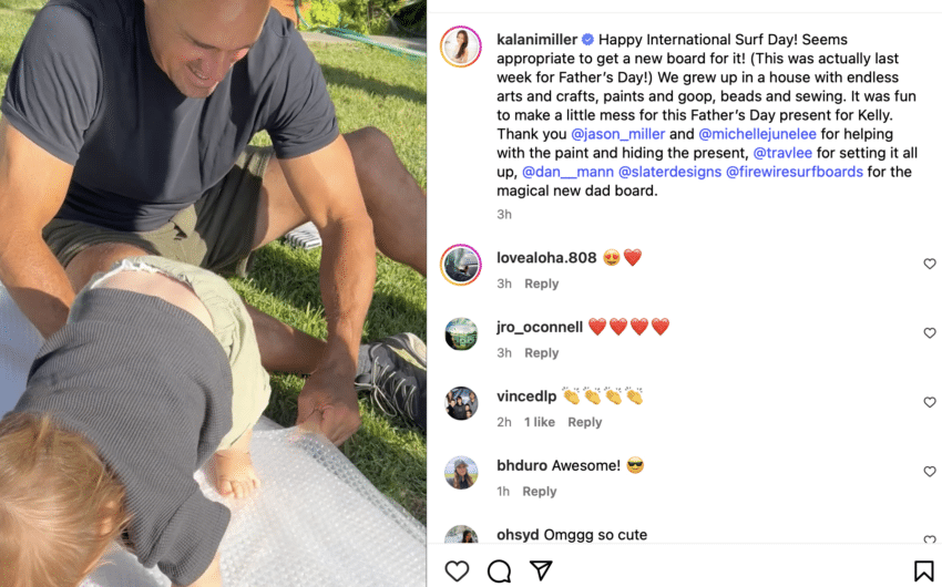Kelly Slater with baby Tao.