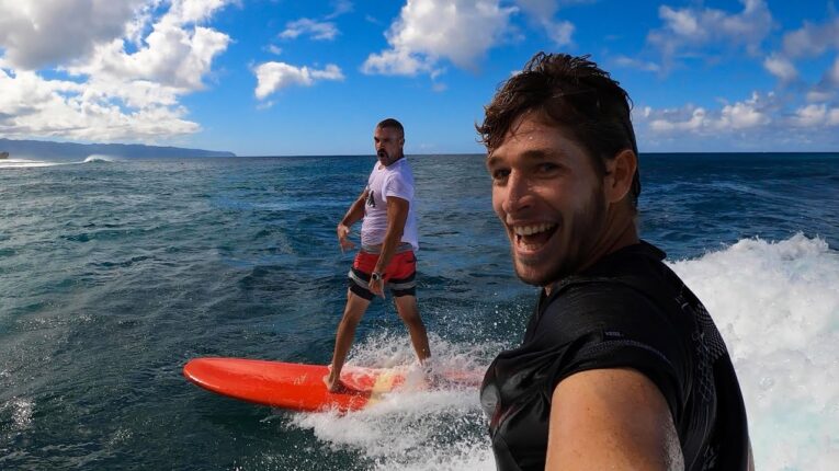Nathan Florence surfing with Daddy John.