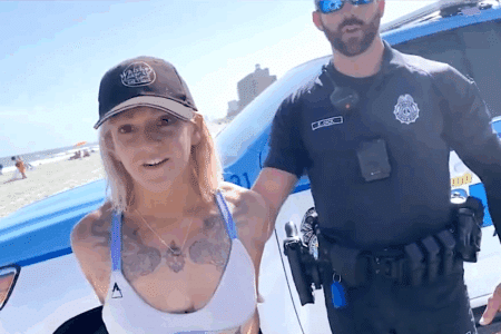 Myrtle Beach cops detain woman for wearing sexy bikini.