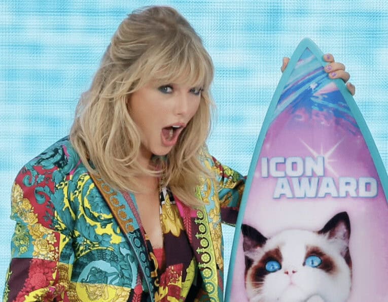 Taylor Swift (pictured) with Dennis Jarvis shaped board.
